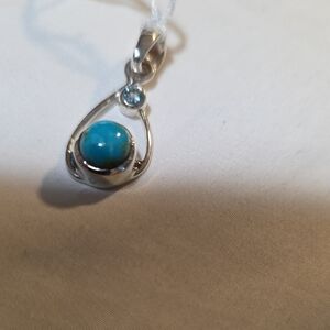 Elegant Sterling Silver and Blue Topaz With Mexican Turquise Pendant.